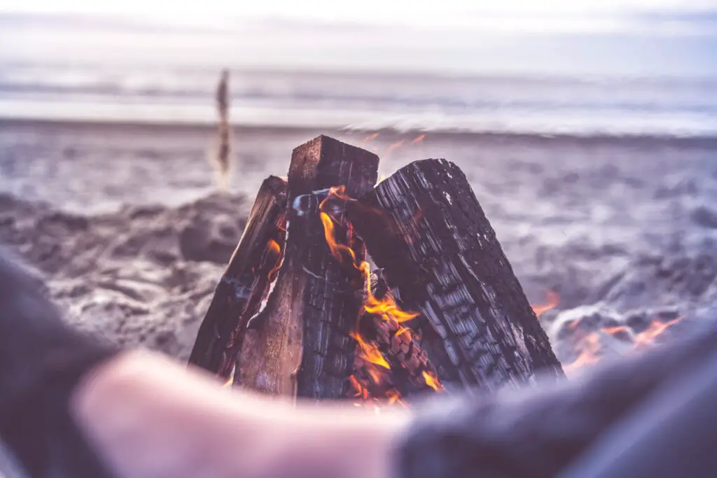 bonfire while camping on the beach